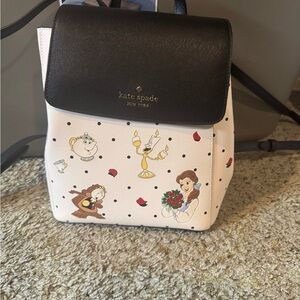Kate Spade Black and Cream Backpack with Playful Characters